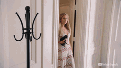 Paris Hilton Walking With Black Cat GIF