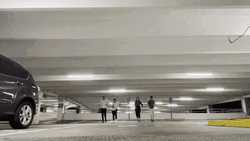 Parking Lot Four Man Speed Walking GIF