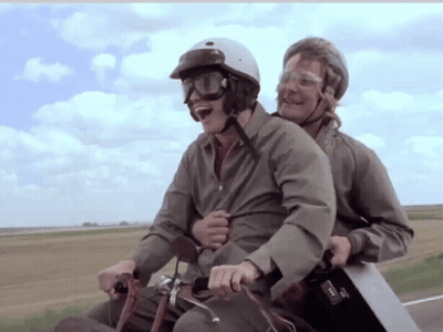 Passenger In Helmet And Goggles On Motorcycle GIF