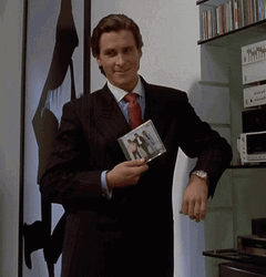 Patrick Bateman Holding A CD GIF