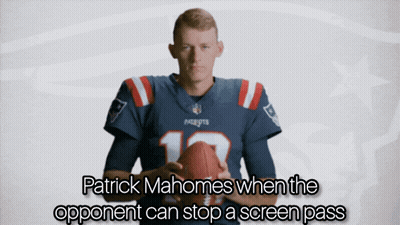 Patrick Mahomes Holding Football When Opponent Stops Screen Pass GIF