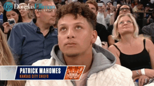 Patrick Mahomes Sits In A Crowd Watching A Game GIF