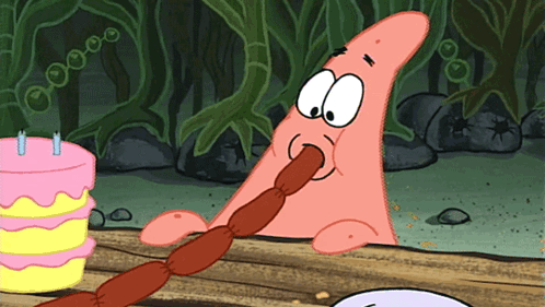 Patrick Star From Spongebob Eating A Sausage With A Cake In The Background GIF