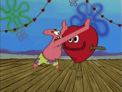 Patrick Star From Spongebob Is Dancing With A Red Heart GIF