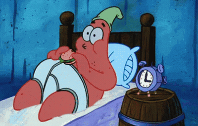 Patrick Star From Spongebob Is Laying In Bed Eating A Watermelon GIF