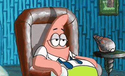 Patrick Star From Spongebob Is Sitting In A Chair With His Eyes Closed GIF