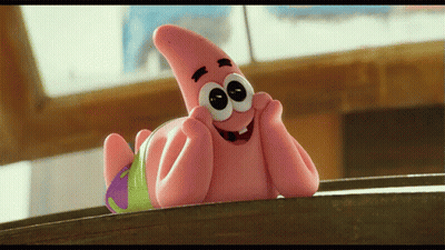 Patrick Star From Spongebob Squarepants Is Laying On A Table With His Hands On His Face GIF