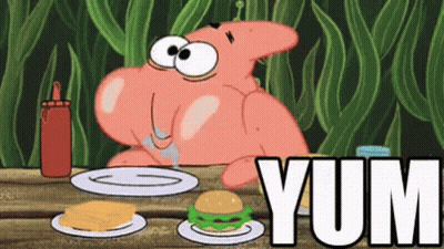 Patrick Star From Spongebob Squarepants Is Sitting At A Table Eating A Hamburger And Cheese . GIF