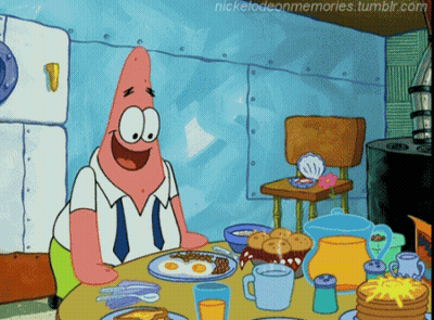 Patrick Star From Spongebob Squarepants Is Sitting At A Table Eating Breakfast GIF