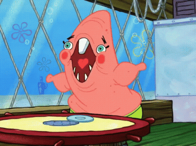 Patrick Star From Spongebob Squarepants Is Sitting At A Table With A Cd On It GIF