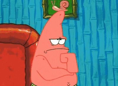 Patrick Star From Spongebob Squarepants Is Sitting On A Red Couch With His Arms Crossed . GIF