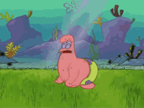Patrick Star From Spongebob Squarepants Is Sitting On The Grass GIF