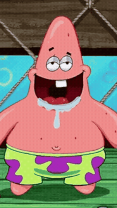 Patrick Star From Spongebob Squarepants Is Standing On A Wooden Deck With His Mouth Open GIF