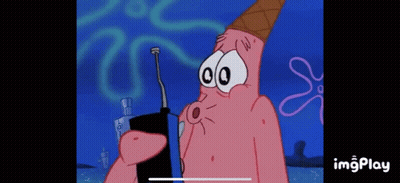 Patrick Star From Spongebob Squarepants Is Wearing An Ice Cream Cone And Holding A Remote Control . GIF