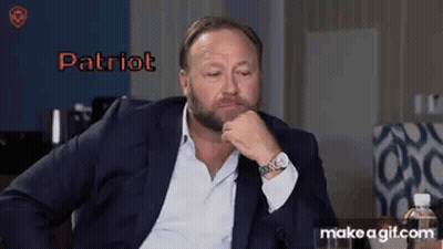 Patriot Man In Suit Hand On Chin GIF