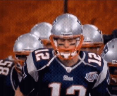 Patriots Players In Huddle With Helmets GIF