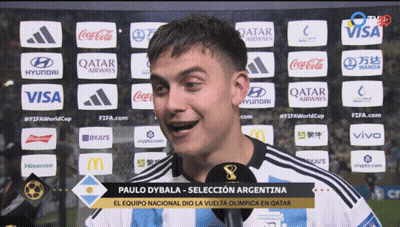 Paulo Dybala Talking Into Microphone in Front of Qatar Airways Coca Cola Visa Logos