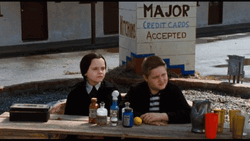 Peacefully Sitting Wednesday Addams GIF