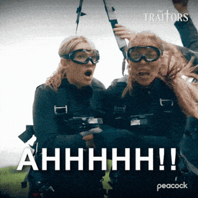 Peacock Ad For The Traitors Two Women Jumping GIF
