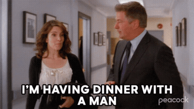 Peacock Ad Man And Woman Talking In Hallway GIF