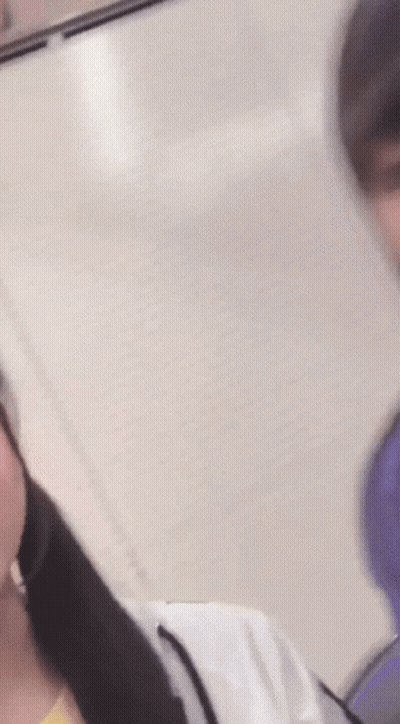 Peacock Logo On Screen Behind Crowd GIF