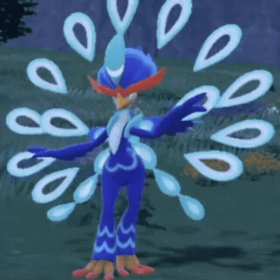 Peacock With Blue Feathers In Grassy Field GIF