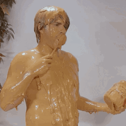 Peanut Butter Fully Coated Man Eating Itself GIF