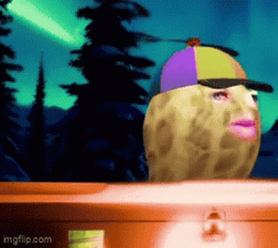 Peanut Wearing Colorful Hat And Pink Lip Beside Suitcase GIF