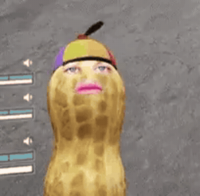 Peanut With Woman's Face Wearing Colorful Hat GIF