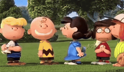 Peanuts Characters Standing In Line On Green Field GIF
