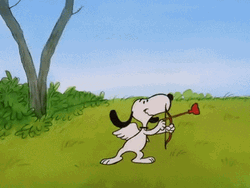 Peanuts Snoopy Aiming Valentines Arrow To Charlie Brown GIF