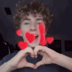 Pearcy Jackson Hearts And Peace Pose GIF