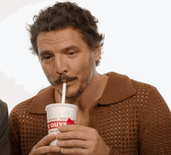 Pedro Pascal Eating Sandwich With Drinks GIF