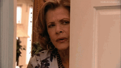 Peeking Lucille Bluth Closing Door GIF