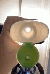 Peeping Inside Lotion Bottle GIF