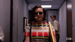 Peggy Olson Walking With Sunglasses GIF