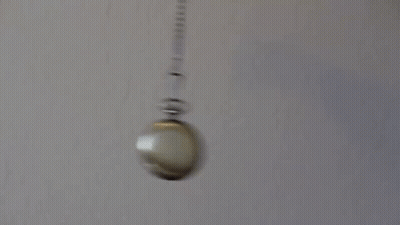 Pendulum Swinging With Ball GIF