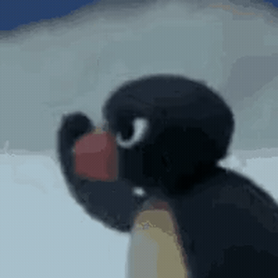 Penguin Holding Apple In Snow GIF