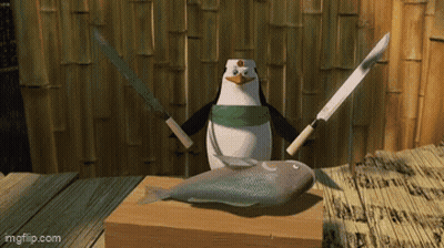 Penguin Holding Knives And Fish On Cutting Board GIF