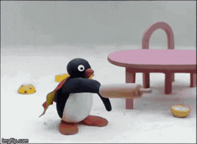 Penguin Holding Rolling Pin GIF