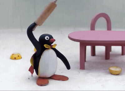 Penguin Holding Rolling Pin GIF