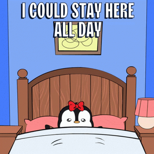 Penguin In Bed Saying I Could Stay Here All Day GIF