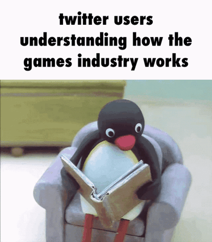 Penguin Reading Book About Games Industry GIF