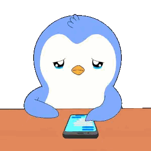 Penguin Sitting At Table Looking At Cellphone Sticker