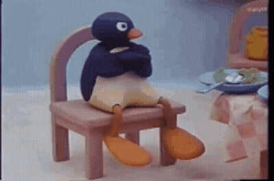 Penguin Sitting Crossed Arms GIF