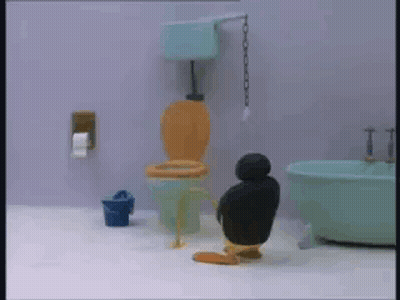 Penguin Sitting On Toilet GIF