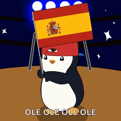 Penguin Wearing Hat Holding Spanish Flag GIF