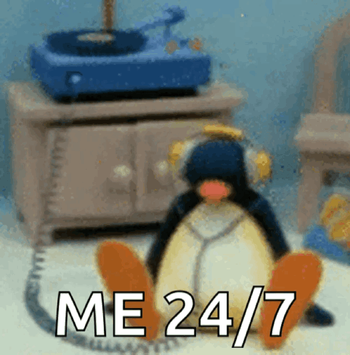 Penguin Wearing Headphones Saying Me 24/7 GIF
