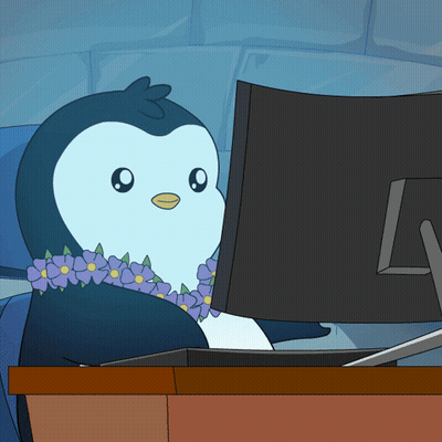 Penguin Wearing Lei Looking At Computer Monitor GIF