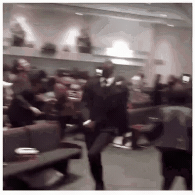 Penguins Sitting At Desks Celebrating School's Out GIF